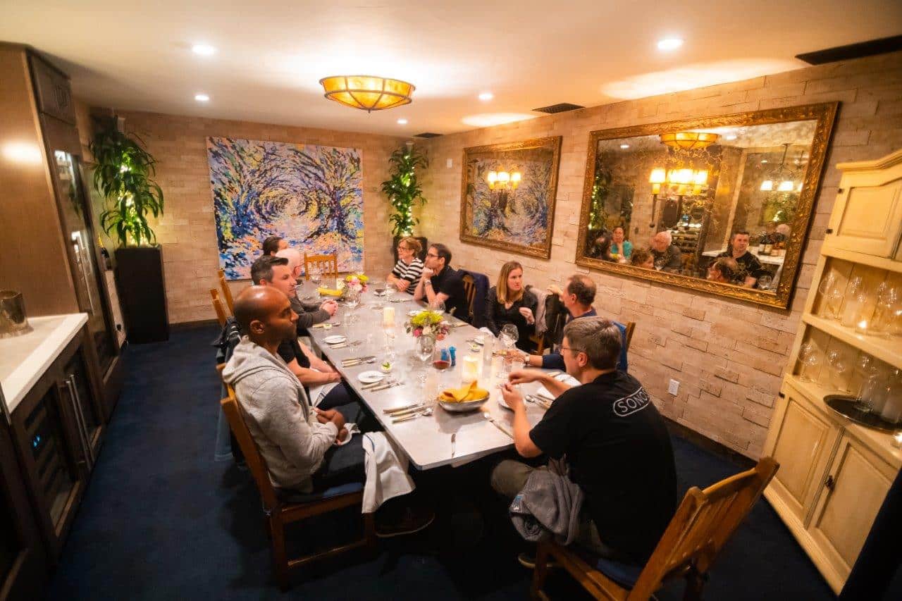 Cork Room people at dining table